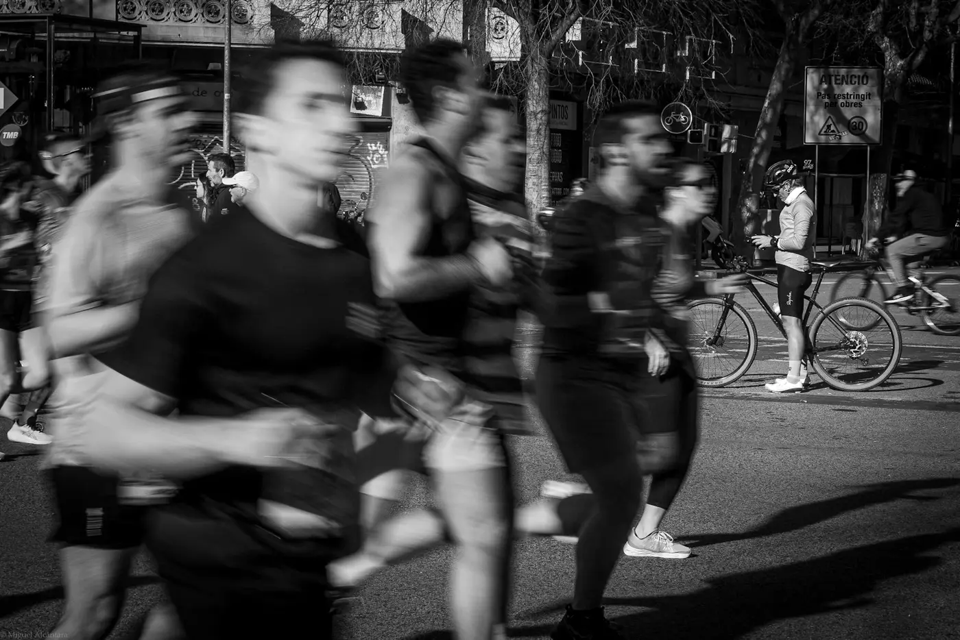 Runners packed close together in a race, motion blur